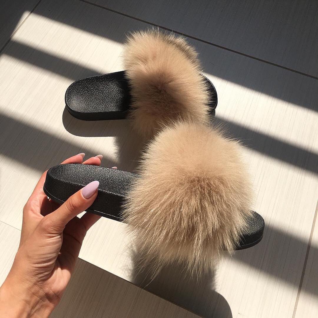 beige fox fur slides