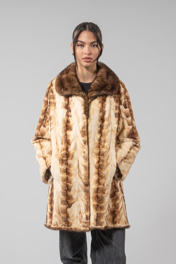 Veste en fourrure de vison blanc doré avec col en V