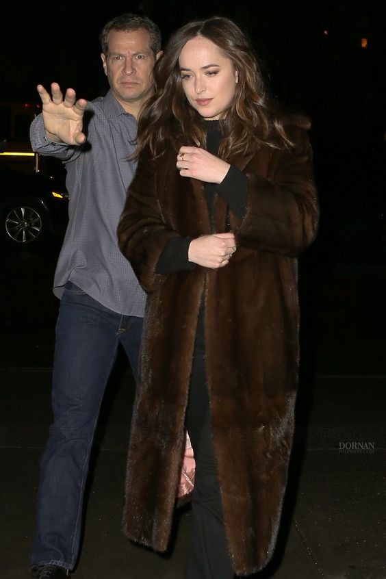 Dakota Johnson and her shades of brown mink .