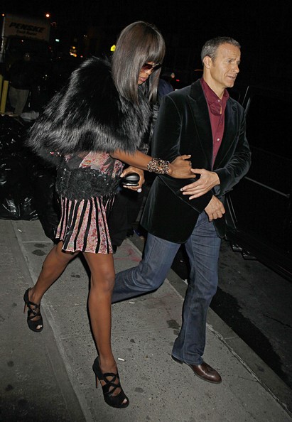 The supermodel wearing a black fox fur cape and the Russian boyfriend Vladislav Doronin in New York City.