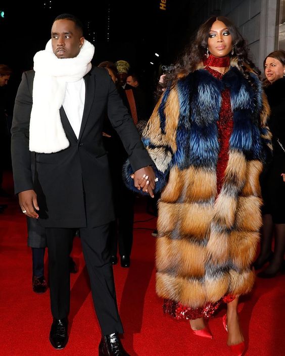 Naomi Campbell and Diddy in the 2018 Pirelli Calendar Launch Gala at The Pierre Hotel. The supermodel wearing a full length fox fur coat!