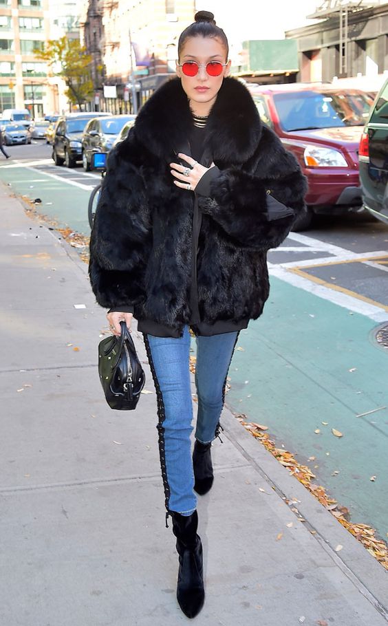 bella hadid in black fur and jeans